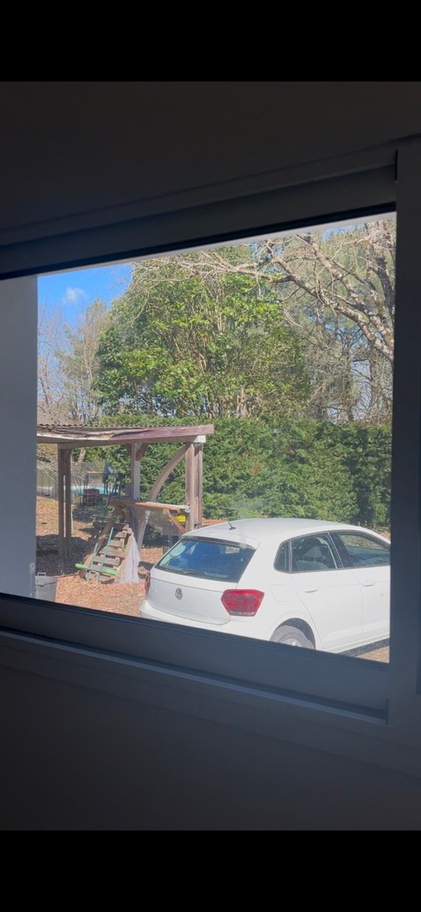 Vitre coulissante avant nettoyage